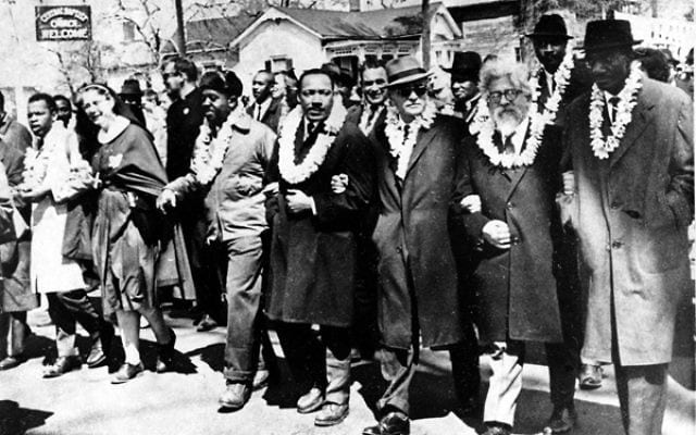 Rabbi Abraham Joshua Heschel marching with Martin Luther King, Jr.